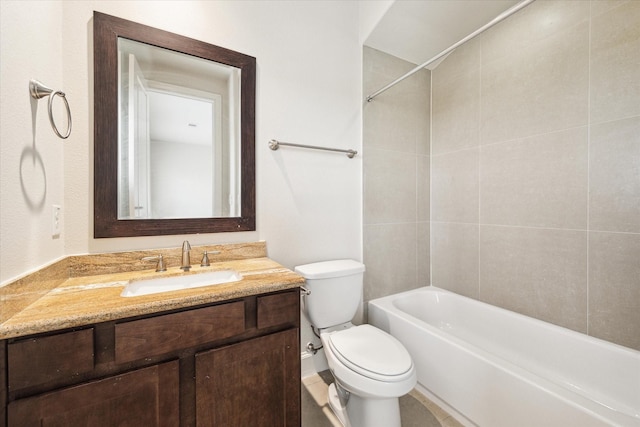 full bathroom with vanity, toilet, and tiled shower / bath combo