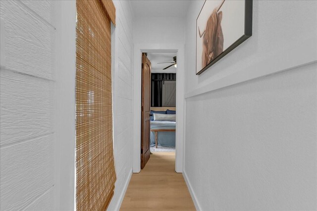 1411 Clay St, Brenham, TX 77833 - corridor with light wood-style floors