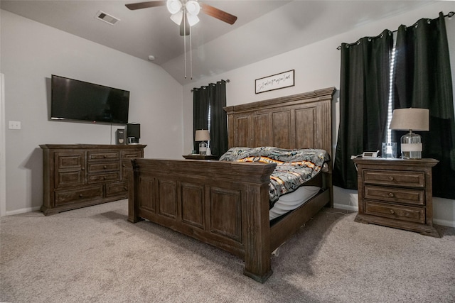 carpeted bedroom featuring ceiling fan and lofted ceiling