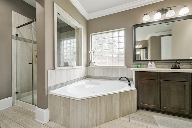 bathroom with vanity, shower with separate bathtub, and crown molding