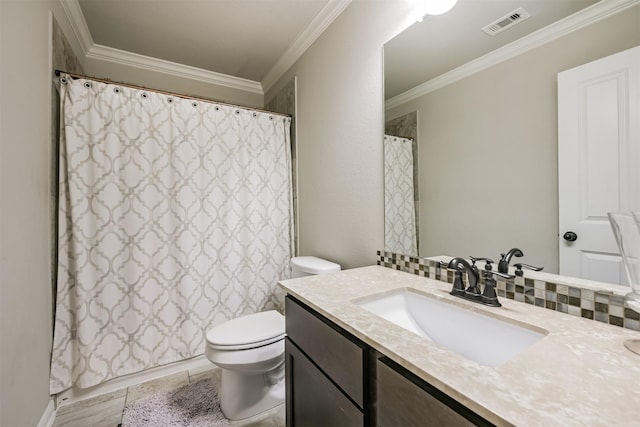 bathroom featuring ornamental molding, toilet, tile patterned flooring, and vanity