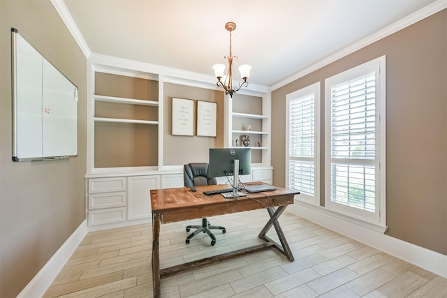 office featuring ornamental molding, a healthy amount of sunlight, an inviting chandelier, and built in shelves