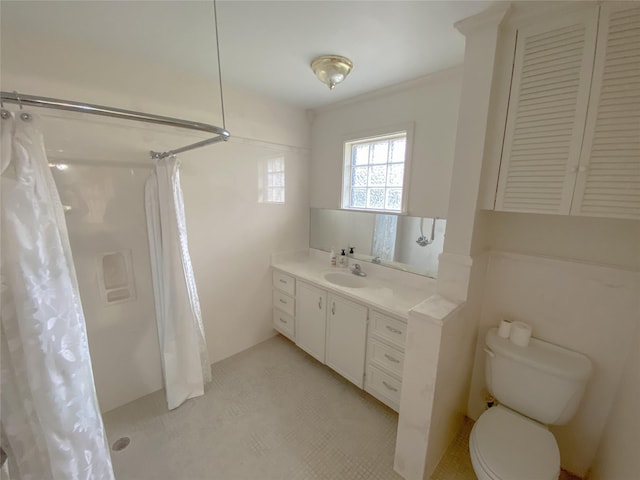 bathroom with walk in shower, vanity, and toilet