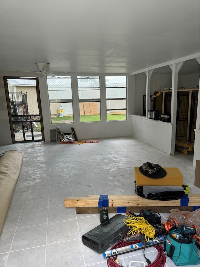 living room with tile patterned floors