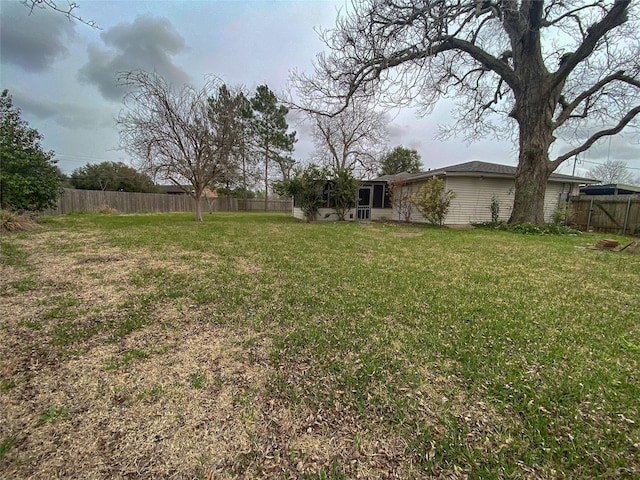 view of yard featuring a fenced backyard