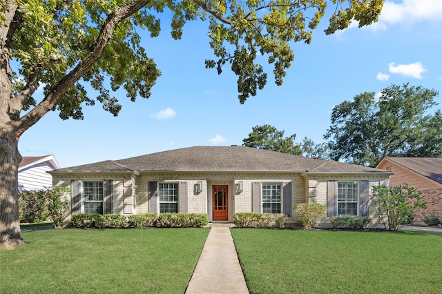 ranch-style house with a front lawn