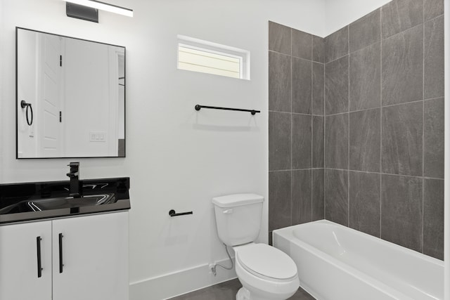 full bathroom featuring vanity, toilet, and tiled shower / bath combo