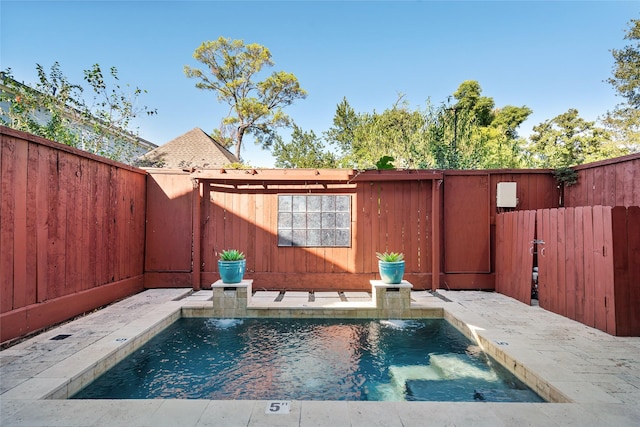 view of swimming pool featuring pool water feature