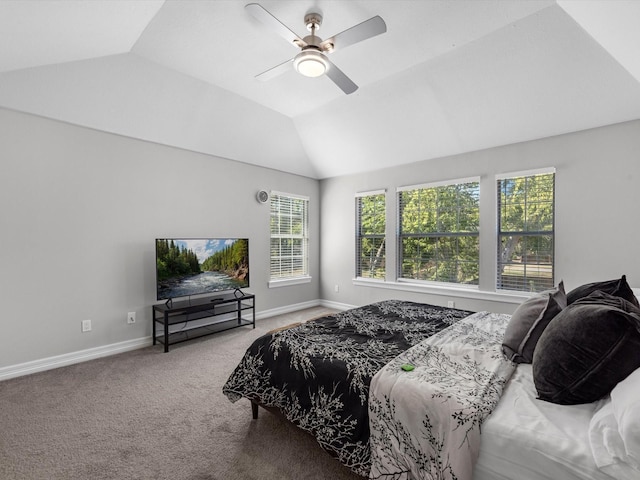 bedroom featuring ceiling fan, carpet floors, and vaulted ceiling