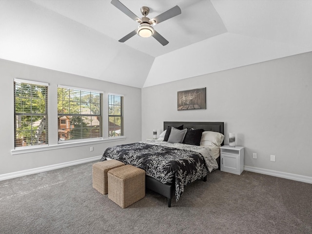 carpeted bedroom with ceiling fan, lofted ceiling, and multiple windows