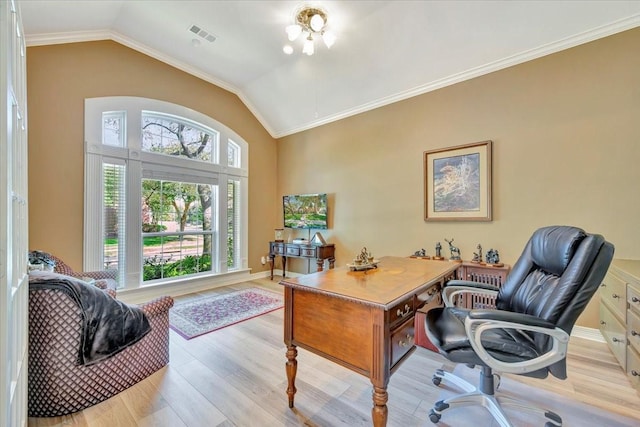 home office featuring light hardwood / wood-style floors, crown molding, and vaulted ceiling