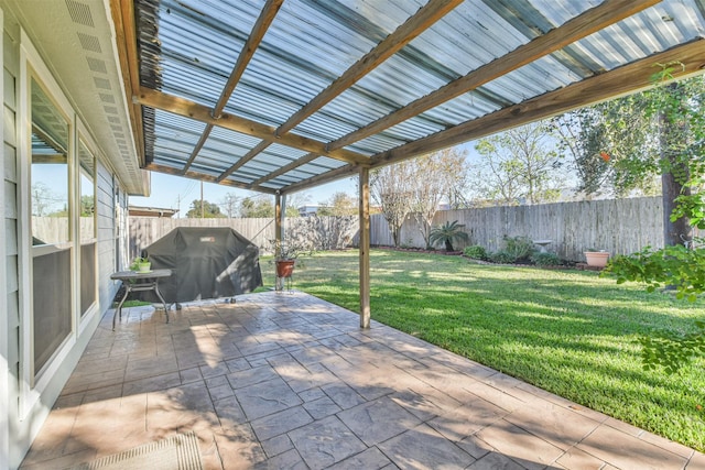 view of patio with a grill