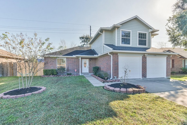 view of front of house with a front yard and a garage