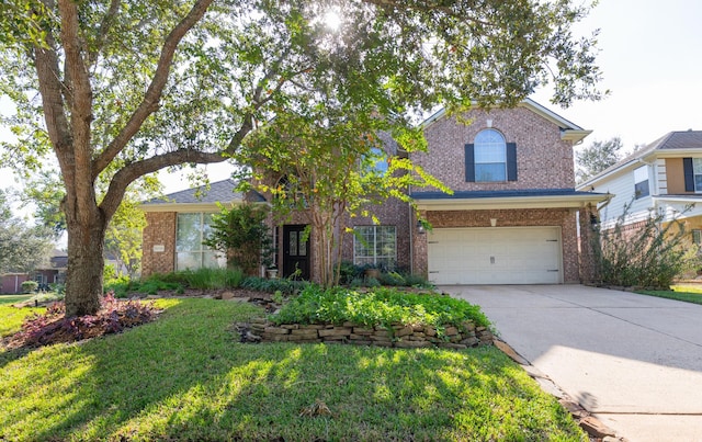 view of front facade featuring a front yard and a garage