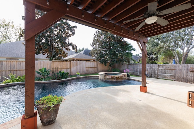 view of swimming pool featuring ceiling fan, an in ground hot tub, and a patio