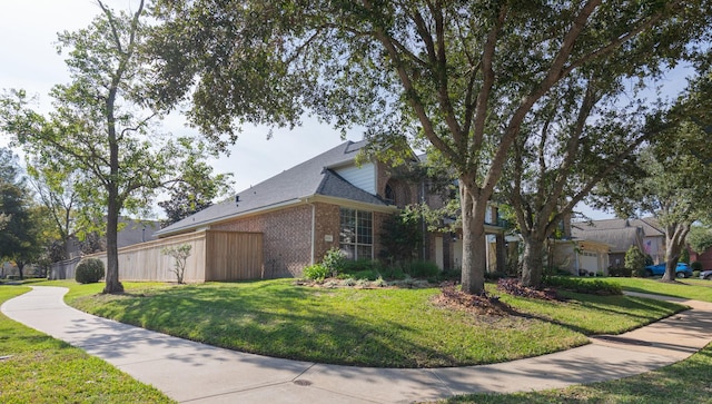 view of property exterior featuring a yard