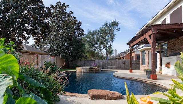 view of pool with an in ground hot tub and a patio