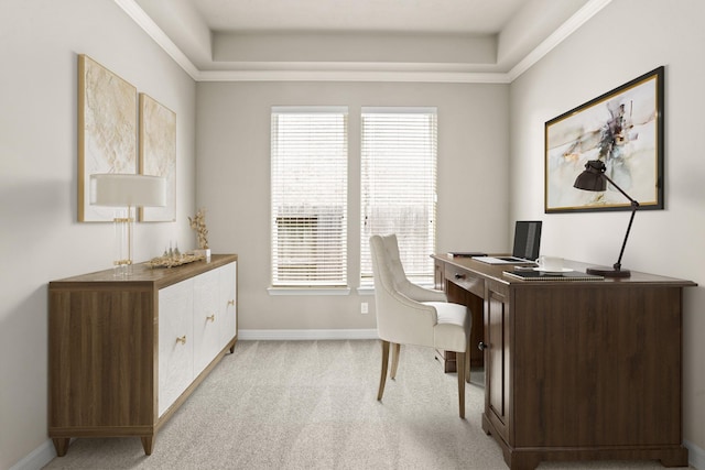 home office featuring a tray ceiling, light carpet, and plenty of natural light