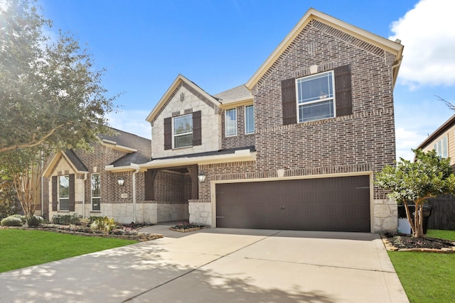 front of property with a garage