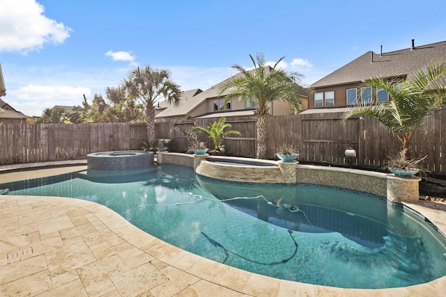 view of swimming pool featuring an in ground hot tub