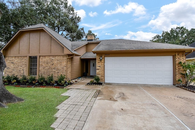 single story home with a garage and a front yard