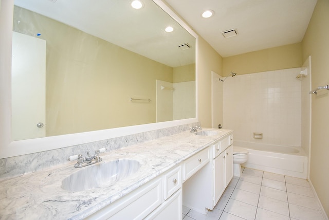 full bathroom featuring tile patterned flooring, vanity, toilet, and tiled shower / bath