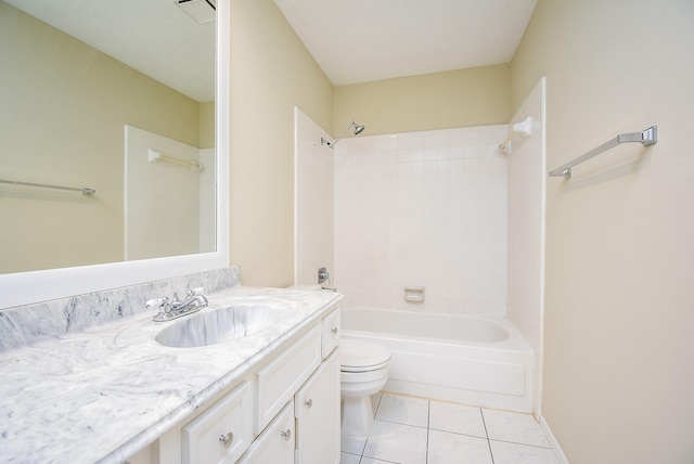 full bathroom with vanity, tile patterned flooring, tiled shower / bath, and toilet