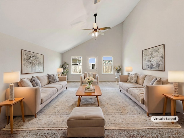 carpeted living room featuring ceiling fan and lofted ceiling