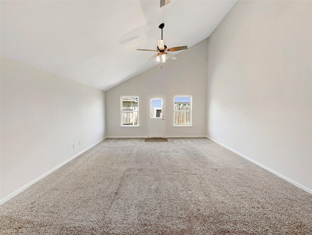 unfurnished living room featuring light colored carpet, high vaulted ceiling, and ceiling fan