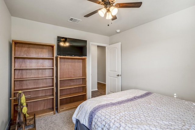 carpeted bedroom featuring ceiling fan