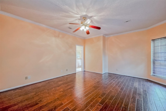 spare room with dark hardwood / wood-style floors, ceiling fan, ornamental molding, and a textured ceiling