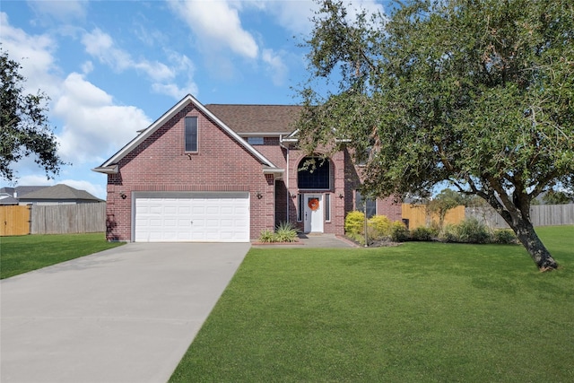 view of front of home with a front lawn and a garage