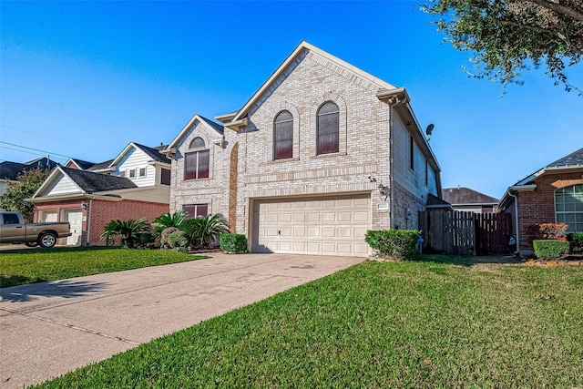 view of front facade with a front yard and a garage