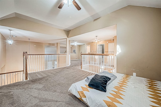 interior space featuring lofted ceiling and carpet floors