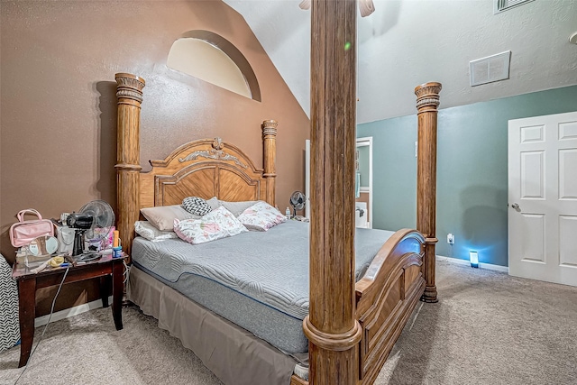 carpeted bedroom with ceiling fan and lofted ceiling