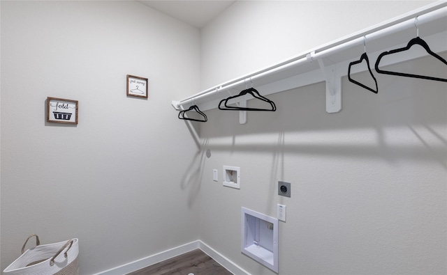 laundry room featuring electric dryer hookup, dark hardwood / wood-style flooring, and washer hookup