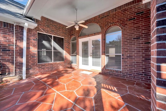 view of patio / terrace featuring ceiling fan and french doors