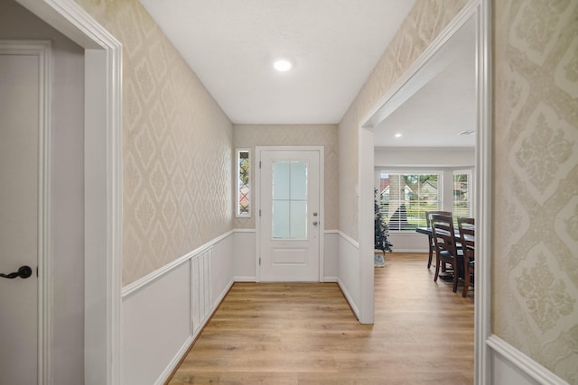 entryway with light hardwood / wood-style floors