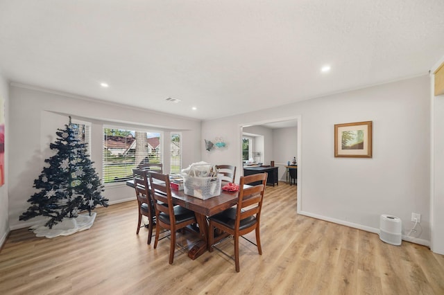 dining area featuring light hardwood / wood-style floors