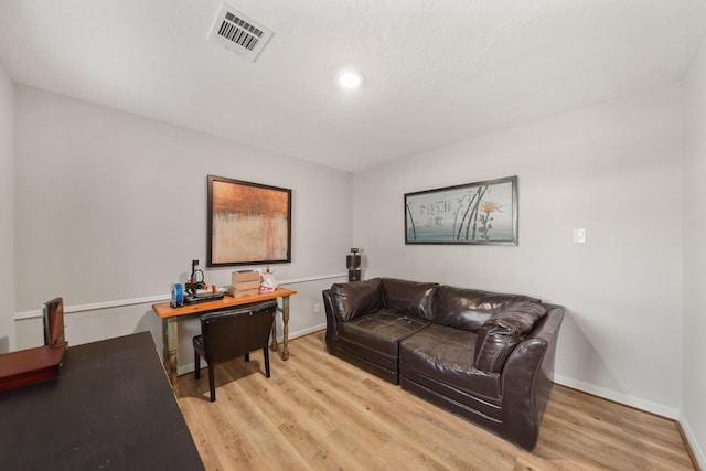 living room with light wood-type flooring