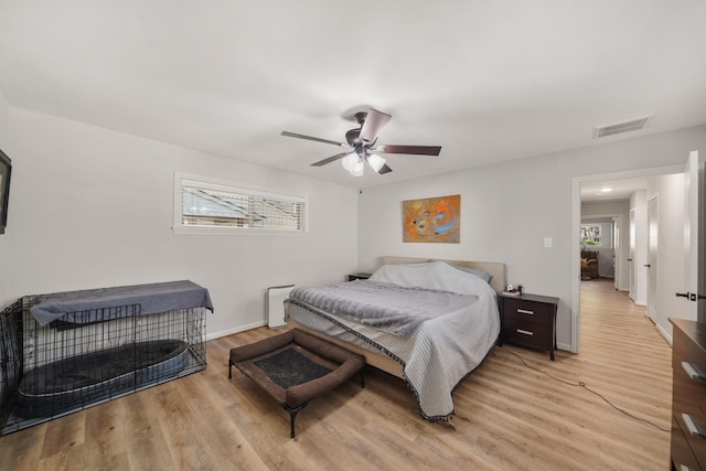 bedroom featuring ceiling fan and light wood-type flooring