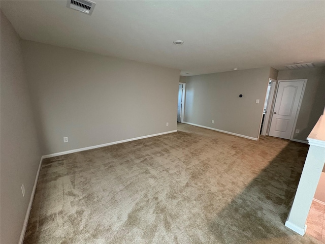 empty room featuring carpet floors