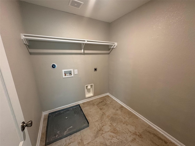 clothes washing area featuring washer hookup and electric dryer hookup