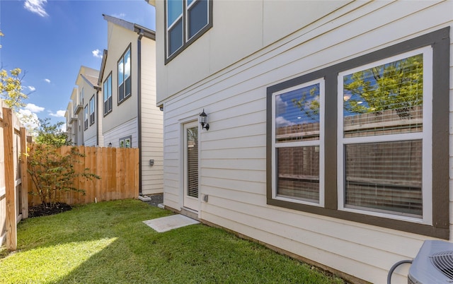 view of home's exterior featuring a yard