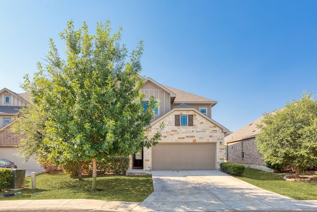 obstructed view of property featuring a front lawn and a garage