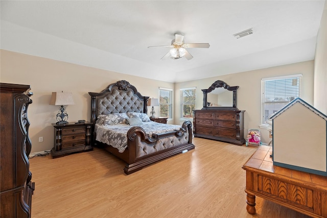 16507 Cypress Brook Ct, Cypress, TX 77429 - bedroom featuring light wood finished floors and a ceiling fan