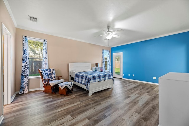 16507 Cypress Brook Ct, Cypress, TX 77429 - bedroom featuring crown molding, wood finished floors, baseboards, and a ceiling fan
