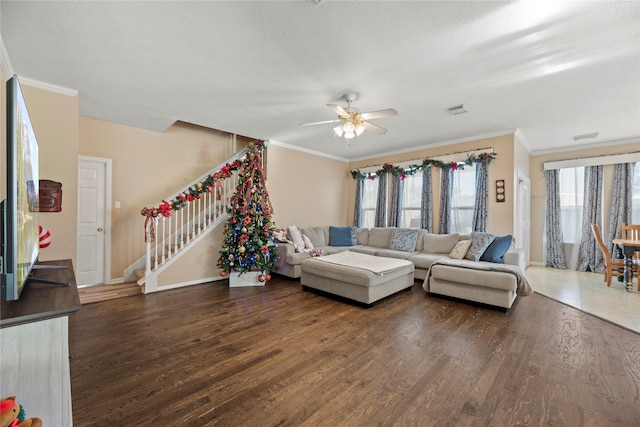 16507 Cypress Brook Ct, Cypress, TX 77429 - living room featuring stairway, ornamental molding, wood finished floors, ceiling fan, and baseboards