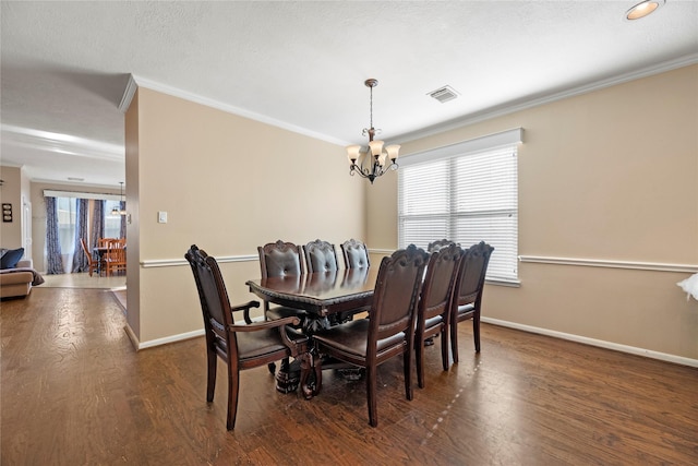 16507 Cypress Brook Ct, Cypress, TX 77429 - dining room with a chandelier, crown molding, wood finished floors, baseboards, and healthy amount of natural light