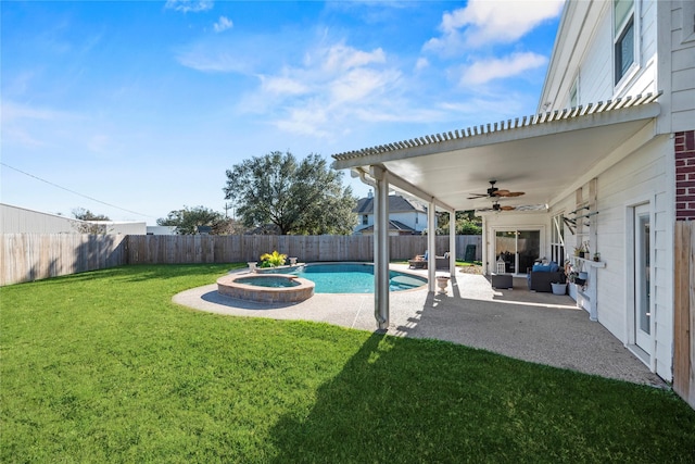 16507 Cypress Brook Ct, Cypress, TX 77429 - view of yard featuring ceiling fan, a patio area, a pool with connected hot tub, and an outdoor hangout area